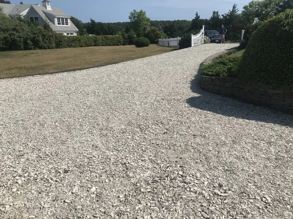 Crushed stone driveway around the bend