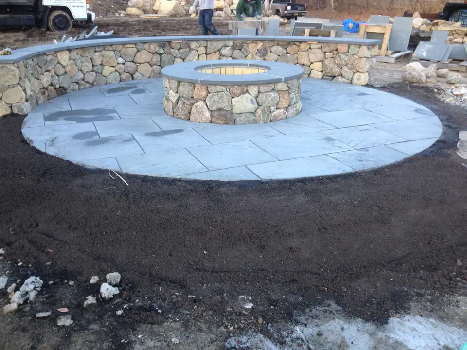 Bluestone pad, fire pit and seat wall, the day they were finished