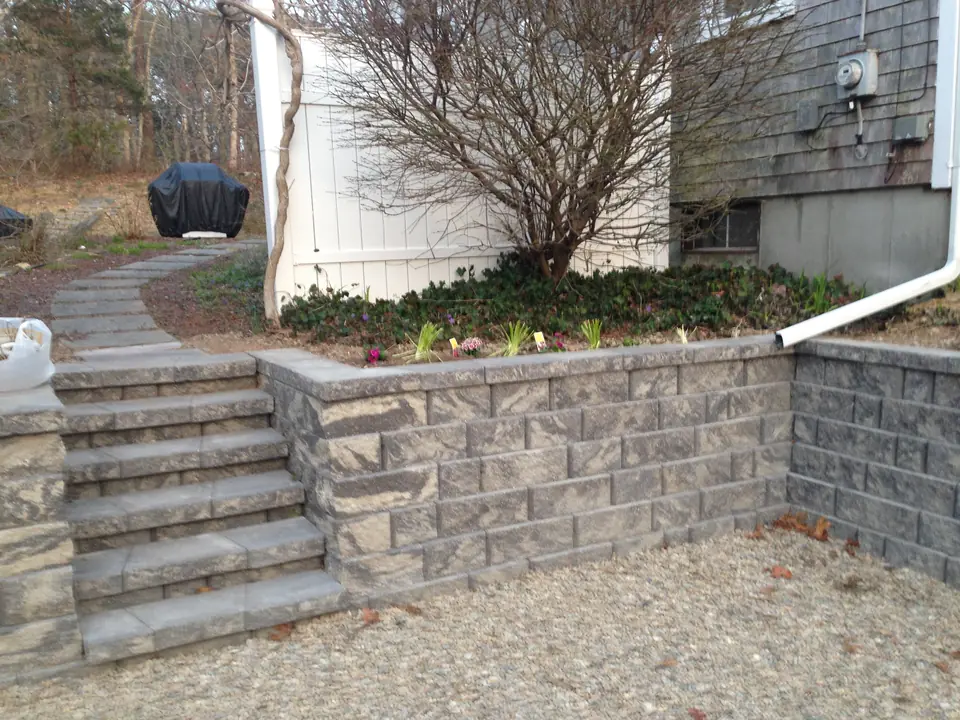 Block wall and steps along a side yard