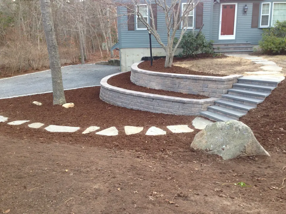 Raised planters and steps in wall block