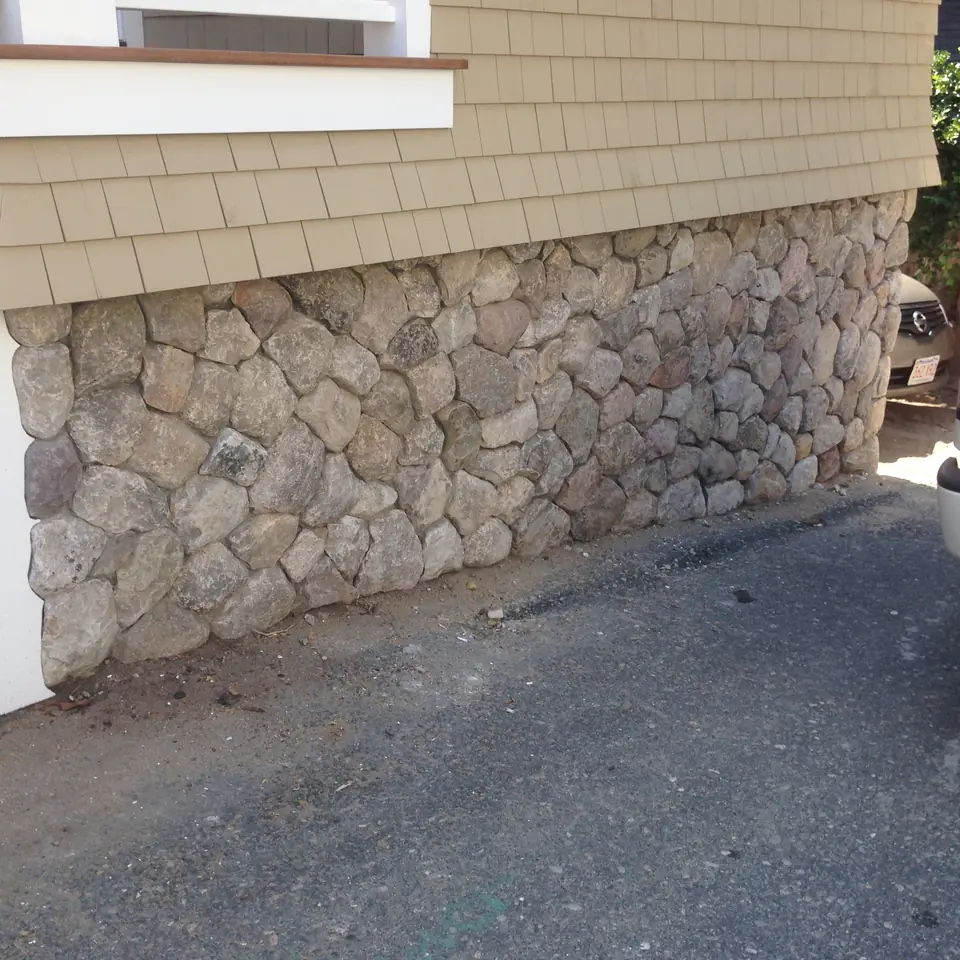Fieldstone veneer on a foundation wall