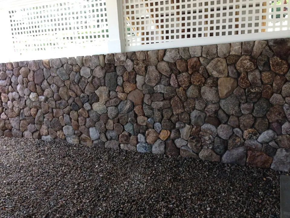 Fieldstone veneer under a porch